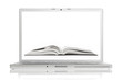 Open book on screen of high-end aluminium laptop Open book on screen of high-end aluminium laptop