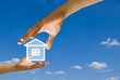 Big hand give the house icon to small hand