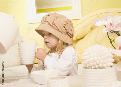 Photo: Girl Holding Mug Girl Holding Mug