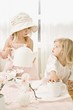 Two Girls Having A Tea Party