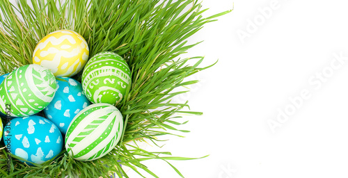 Foto: Easter eggs in a grass Easter eggs in a grass