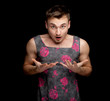 Photo: frightened man dressed as woman, black baskground frightened man dressed as woman, black baskground