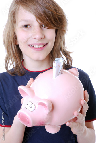 Photo: Junge mit Sparschwein Junge mit Sparschwein