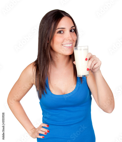 Photo: Beautiful girl drinking milk Beautiful girl drinking milk