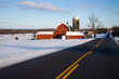 Red Barn Along Road in Winter