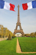 Eiifel Tower with flags of France, Paris