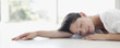 Serene woman napping on floor