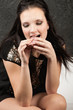 Photo: Woman bites off sandwich Woman bites off sandwich