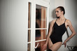 young ballerina is relaxing in class room