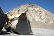 Photo: detail of dipper bucket under big hil of sand detail of dipper bucket under big hil of sand