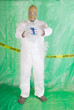Photo: Man in Hazmat clothing in decontamination chamber Man in Hazmat clothing in decontamination chamber