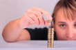 Young woman counting her savings Young woman counting her savings