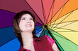 Photo: Beautiful woman with colorful umbrella Beautiful woman with colorful umbrella
