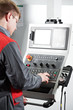 worker at machining tool workshop