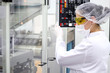 Young Women Operating The Control Panel