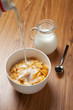 Photo: Bowl of breakfast cereal on wooden surface Bowl of breakfast cereal on wooden surface