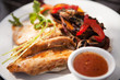 Photo: Chicken fillets on roosterkoek with vegetables Chicken fillets on roosterkoek with vegetables