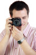 Young man with digital camera