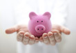 Man holding piggy bank. Shallow DOF Man holding piggy bank. Shallow DOF