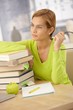 College girl smiling with books