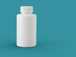 White plastic bottle on sea green