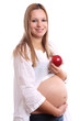 Pregnant woman with apple