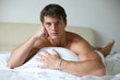 Young Sexy Man on a Bed