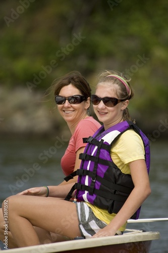 Photo: Women In Boat, Lake Of The Woods, Ontario, Canada Women In Boat, Lake Of The Woods, Ontario, Canada