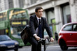 Foto: A businessman commuting to work A businessman commuting to work