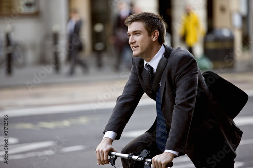 Photo: A businessman commuting to work A businessman commuting to work