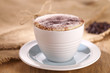 hot frothy drink cappuccino coffee, rustic style, shallow dof hot frothy drink cappuccino coffee, rustic style, shallow dof
