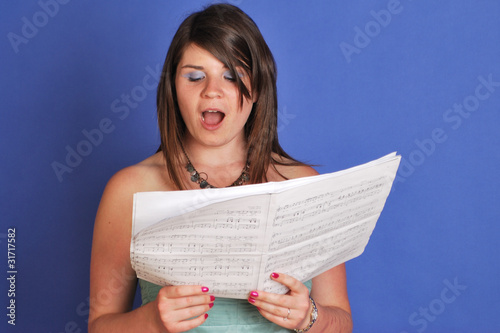 Photo: girl singing girl singing