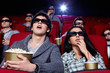 Surprised people are watching a movie