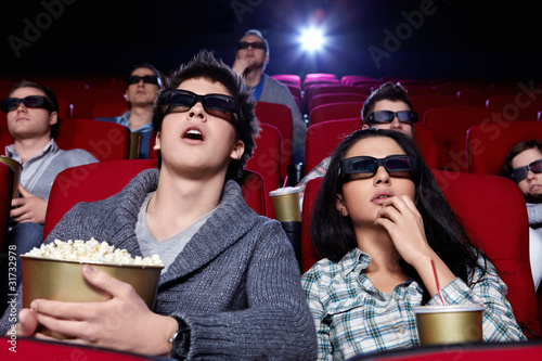 Photo: Surprised people are watching a movie Surprised people are watching a movie