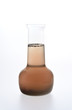 Photo: Sample of dirty water isolated on white background Sample of dirty water isolated on white background