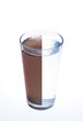 Photo: Clean and dirty water in one glass isolated on white background Clean and dirty water in one glass isolated on white background
