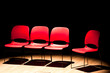 Four chairs under light