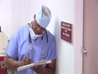 Surgeon making notes