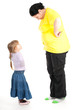 fat mother and preschool daughter having quarrel