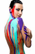 Foto: Brunette with colorful body painting over white background Brunette with colorful body painting over white background