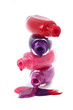 Ñolored nail polish spilling from bottles Ñolored nail polish spilling from bottles