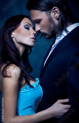 Photo: sexy, romantic portrait of the touching, kissing couple sexy, romantic portrait of the touching, kissing couple