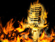 Gold vintage microphone on fire
