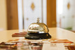hotel bell on a wood stand