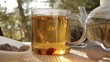 Woman mixes glass of tea outdoors