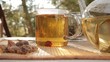 Woman mixes glass of tea outdoors