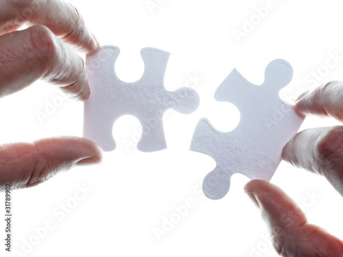 Photo: puzzle game solution teamwork puzzle game solution teamwork