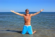 sexy caucasian fit man posing in a beach sexy caucasian fit man posing in a beach