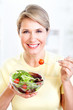 woman eating salad woman eating salad