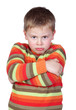 Angry child with crossed arm